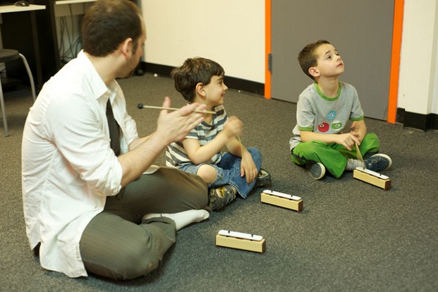 Students at the Bach to Rock music franchise start learning in groups at a very young age.