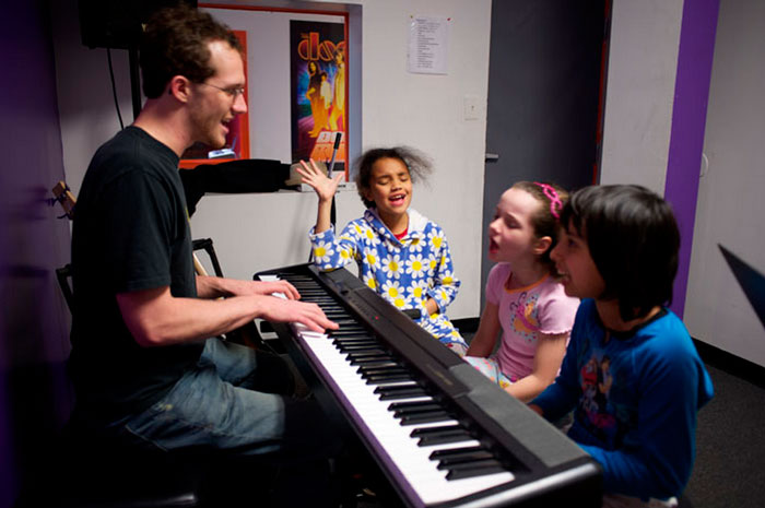 Unlike traditional music instruction, the Bach to Rock franchise turns music into a team sport.